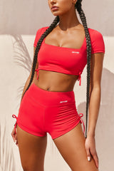 Ambition Slinky Cut Out Crop Top in Red